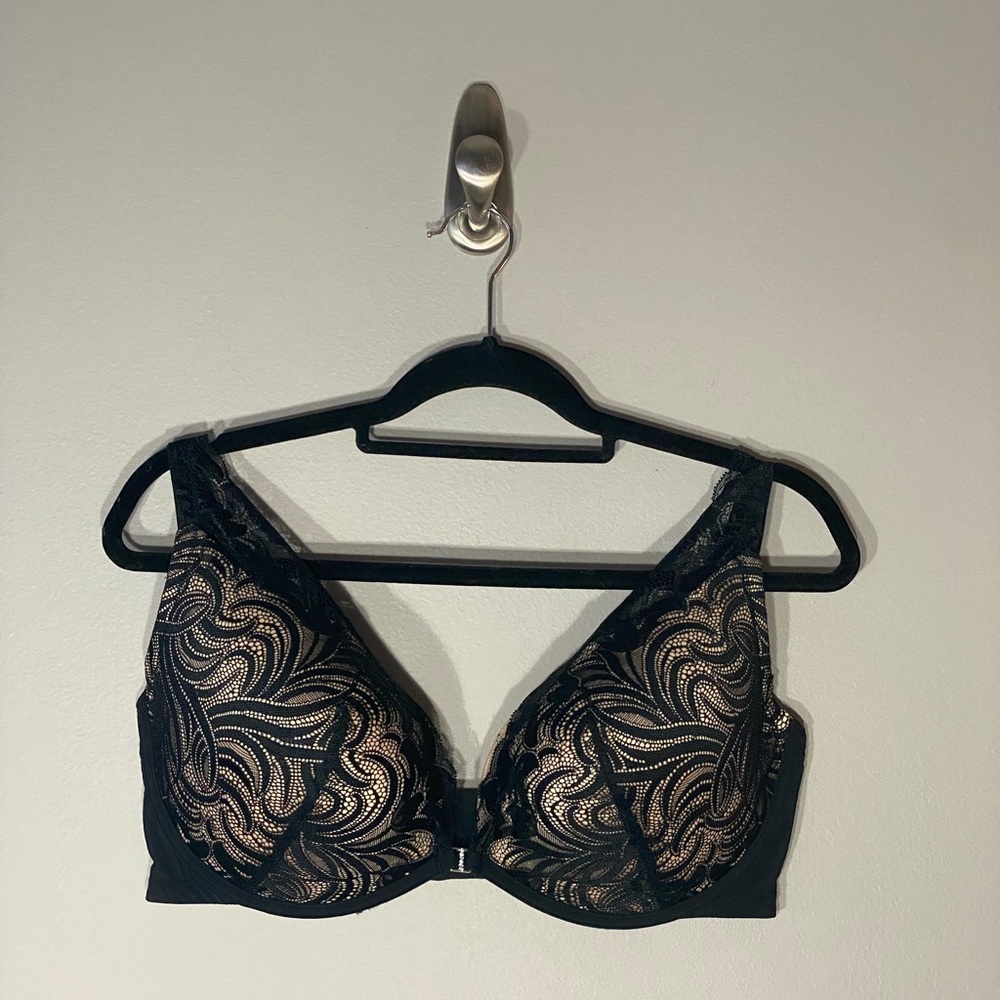 Adore Me 40DD Bra
Black lace over nude 
Rhinestone embellishment in the front